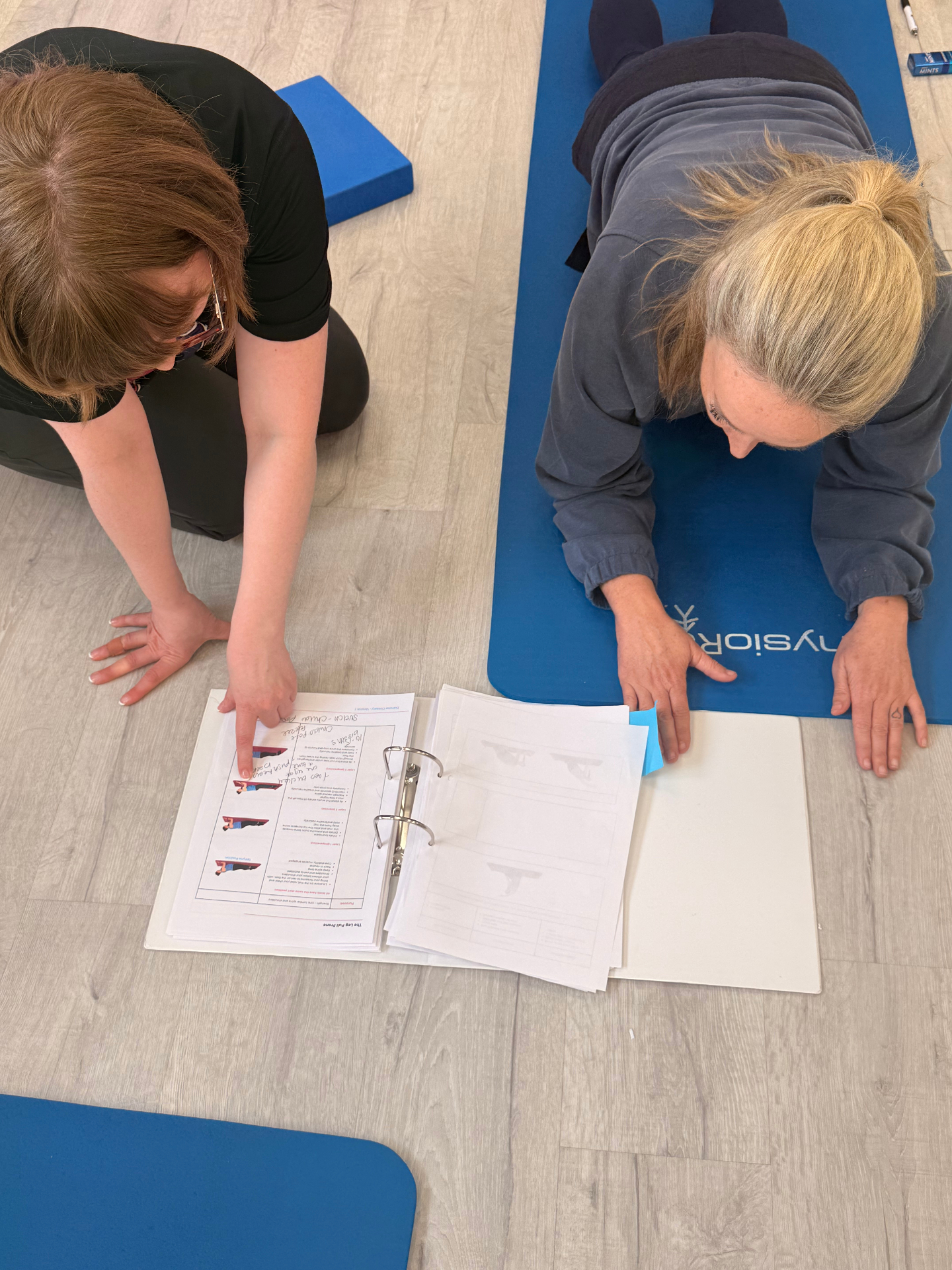 Tara and Emily reviewing workshop notes